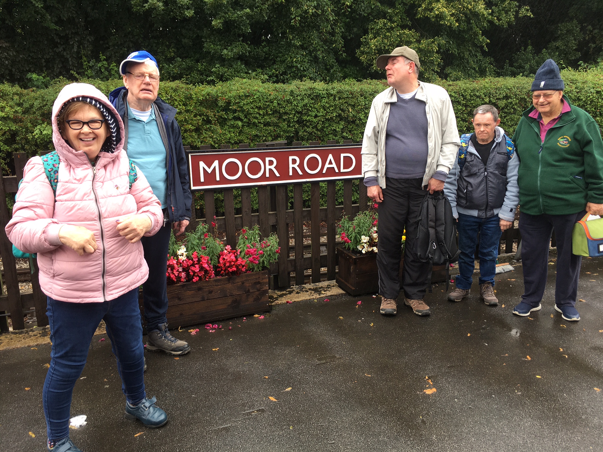 A group of people on a station platform